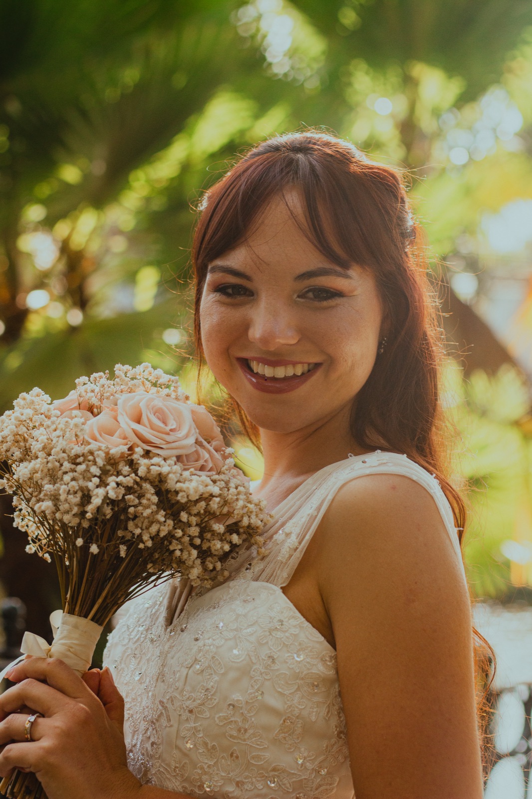 Agus with her dried-flower bouquet