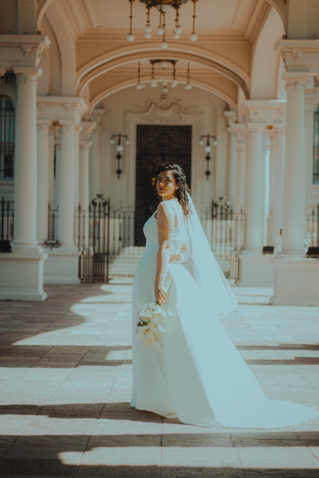 Ani and Agus under the arches