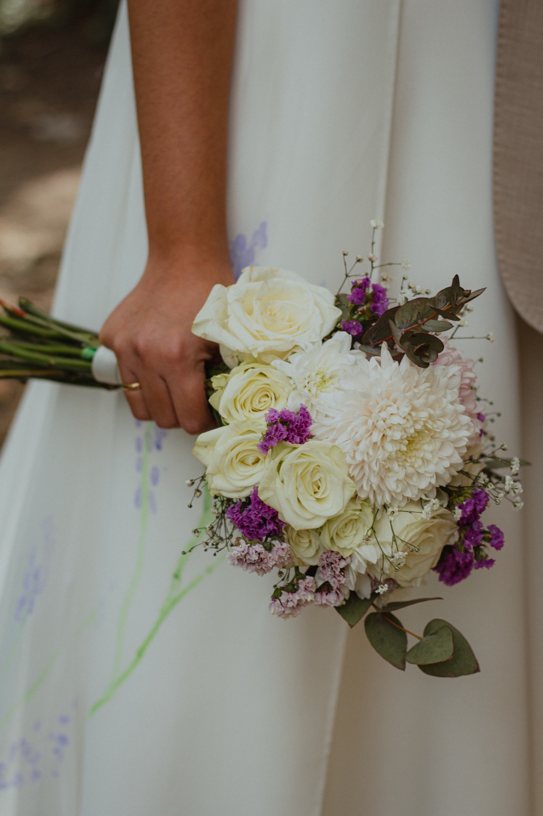 Silvi's bouquet against her dress
